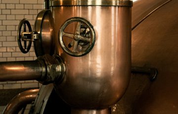 a large metal tank sitting inside of a building